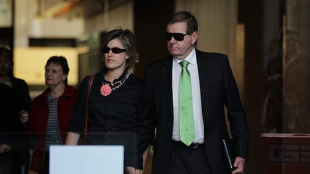 Peter Slipper accompanied by his wife. Photo: Kate Geraghty, Fairfax