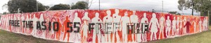 Panorama of completed banner: 55 silhouettes for the 55 refugees in ASIO immigration detention limbo. Photo credit Takver 