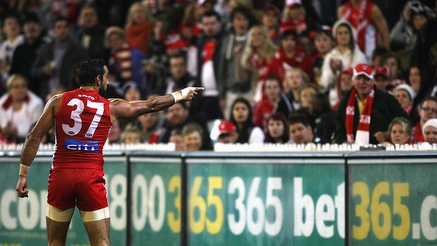 Adam Goodes points the finger after being called an 'ape' by a young Collingwood supporter during the AFL's Indigenous Round. Photo: Andrew White Fairfax