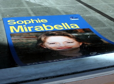 A Mirabella sign hits the dust