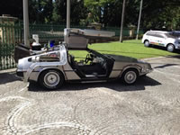 Delorian from BTTF outside QLD Parliament by KAP to highlight reversal of Qld under Newman Government.