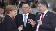 'Blue-tie Man' with German Chancellor Angela Merkel and new Ukrainian President, Petro Poroshenko.