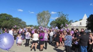 Brisbane Times: Mourners release purple balloons in memory of Talieha.