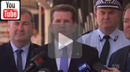 ABC News Qld: Police stand with ministers to trumpet High Court dismissal of VLAD challenge.
