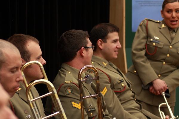 Members of the army band relax before the official party take the stage to open the Spirit of Anzac exhibition. Photo: Wayne Jansson