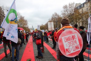 Redlines from the Arc de Triumphe for climate justice