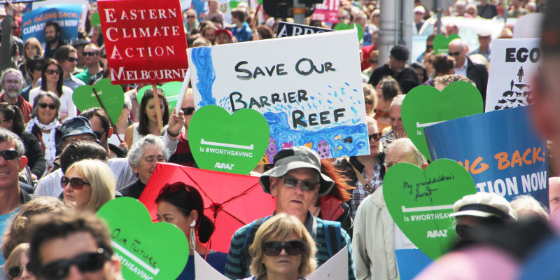 Save our Barrier Reef sign at climate protest. Photo: John Englart