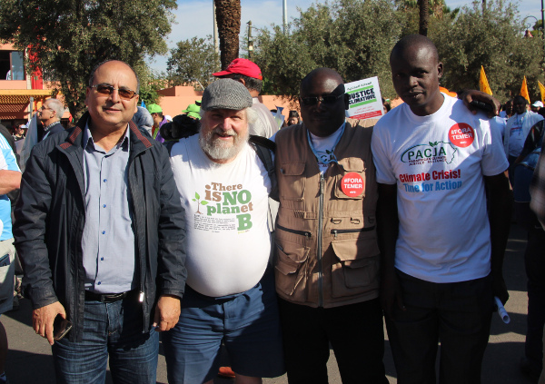 John Englart with a Moroccan and two South African friends at the Climate March